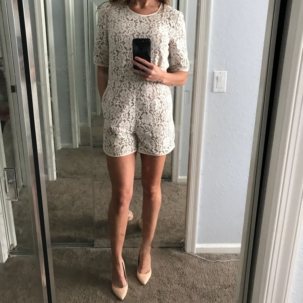 Bcbgmaxazria white lace romper.